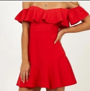 Red off the shoulder mini dress with draped ruffle skirt. Showpo size 6, mild pi